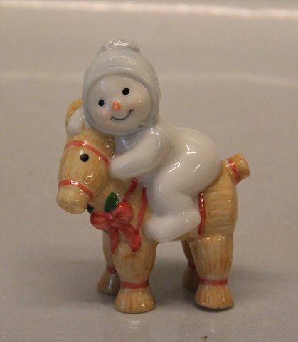 Royal Copenhagen figurine 0761 RC Winther series, Snowman, Baby Arthur Baby on straw goat 8 cm (1249761) Henny Iversen 2010