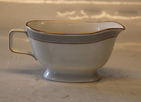 Norma B&G White with grey and gold rim form 674