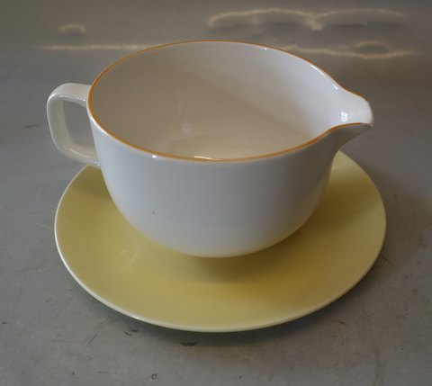 Gul Kant 3085 Sovsekande (565) 7.7 x 15.5 cm & helt gult løst fad (3081-085) 
Årstiderne   4 ALL Seasons Gul Top Royal Copenhagen